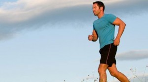 man-jogging-against-blue-sky